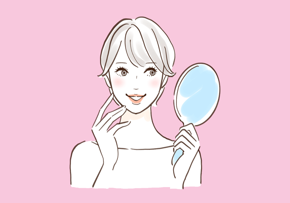 鏡をみる女性